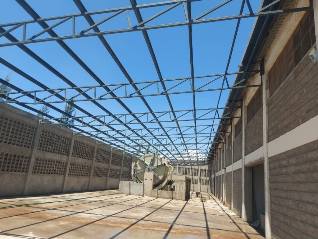 Steel-framed industrial shed constructed by Cadreatech housing PP drums for a tannery facility in Narok County, Kenya.